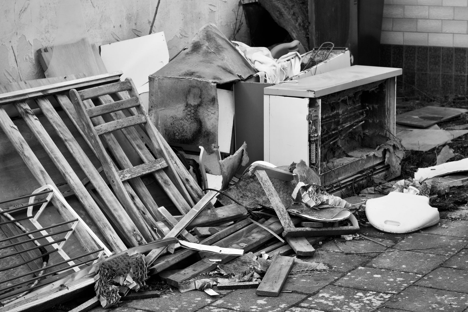 Discarded furniture and household items piled up, illustrating old furniture ready for removal in Vero Beach